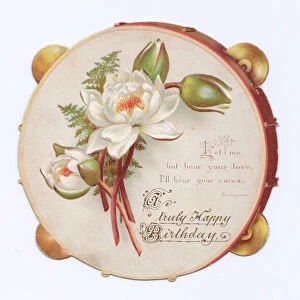A Victorian die-cut shape birthday card of a tambourine with an image of flowers on it, c