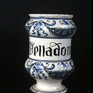 XVI century pharmacy pot containing Belladonna, toxic herb used in pharmacy