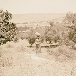 Woman standing jar head Nazareth distance 1925