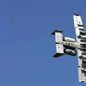 An A-10 Thunderbolt maneuvers through the sky