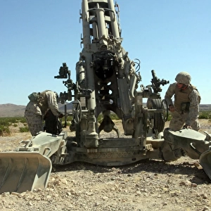 Artillerymen manning the M777 Lightweight Howitzer