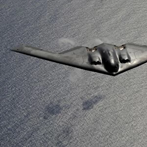 A B-2 Spirit flies over the Pacific Ocean