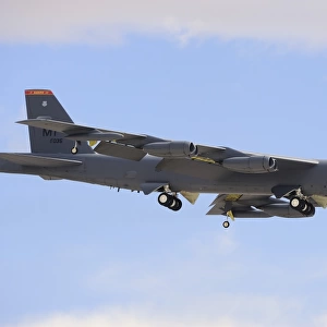A Boeing B-52H Stratofortress prepares for landing