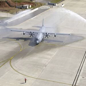 The C-130J lands on Ramstein Air Base for the first time during a ceremony