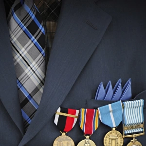 Close-up of medals and awards on the uniform of a retired U. S. Air Force veteran