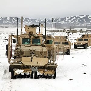 A convoy of vehicles during a route clearing procedure in Afghanistan