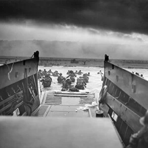 Digitally restored World War II photo of American troops approaching Omaha Beach