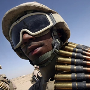Lance Corporal waits for his turn on the M-2. 50-caliber machine gun