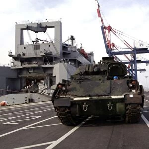A M1A1 Abrams main battle tank is prepared for onload to the USNS Watson