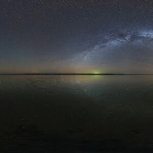 Milky Way with reflection of stars over Lake Elton salt lake in Russia
