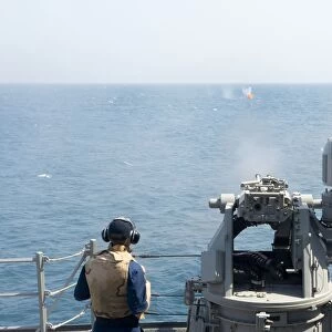 A MK-38 25mm machine gun is fired aboard USS William P. Lawrence