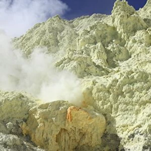 Natural sulphur deposits damaged by miners, Kawah Ijen volcano, Java, Indonesia