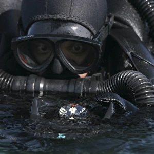 A Navy SEAL combat swimmer
