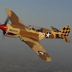 P-40 Warhawk flying over Chino, California
