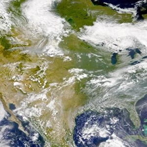 Satellite view of North America with smoke visible in several locations