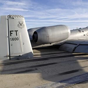The tail section of an A-10 Thunderbolt II makes direct contact with the runway