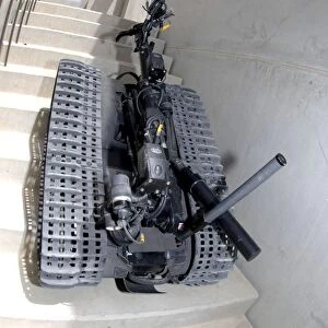A Talon 3B robot unit climbing a flight of stairs during a training mission in Bahrain