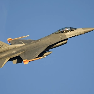 A U. S. Air Force F-16C Fighting Falcon flying over Italy