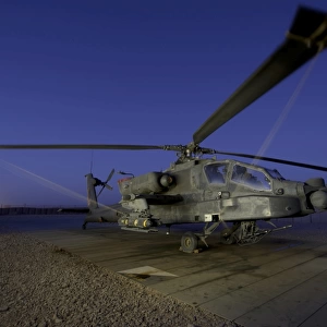A U. S. Army AH-64D Apache helicopter at Shindand Air Base, Afghanistan