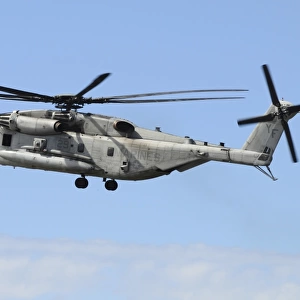 A U. S. Marine Corps CH-53E prepares for landing
