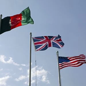 The Union Flag of the United Kingdom between the Afghanistan and United States flags