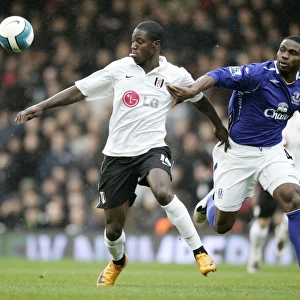 Football - Fulham v Everton Barclays Premier League - Craven Cottage - 16 / 3 / 08 Fulhams Eddie Johnson and Evertons Joseph Yobo Mandatory Credit: Action Images / John Sibley Livepic NO ONLINE / INTERNET USE WITHOUT A LICENCE FROM THE FOOTBALL D