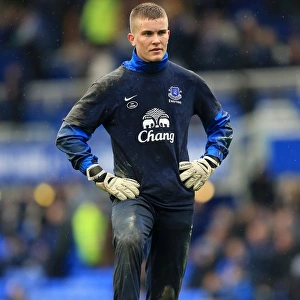 Mason Springthorpe in Deep Thought: Everton Goalkeeper's Contemplative Moment Before FA Cup Quarterfinal vs. Wigan Athletic (Everton 0-3, March 9, 2013)