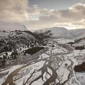 Aerial view over Glenfeshie in winter, Cairngorms National Park, Scotland, UK, January