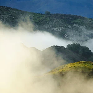 Fog between the mountains. Lagos de Covadonga (Covadonga Lakes) in Picos de Europa National Park