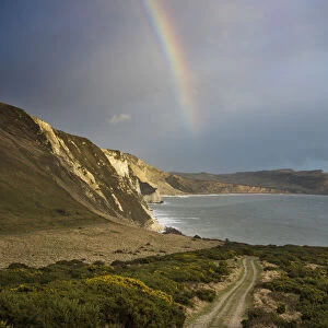 Rainbow over Mupe Bay on Christmas Eve, Jurassic Coast, Dorset, England, UK