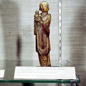 Attendant of Hsi Wang Mu and peaches of Immortal, Ivory Figure, Ming Dynasty