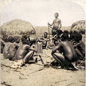 Braves of a Zulu Village holding a Council, near the Umlaloose River, Zululand, S. A. 1901