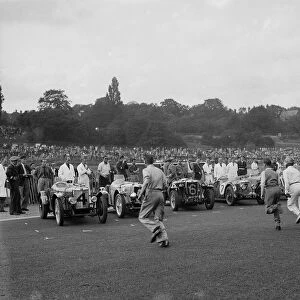 Drivers running to their cars at the start of a race at Crystal Palace, London, 1939