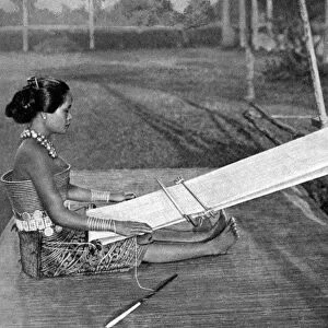 Iban weaver, Borneo, 1922. Artist: Dr Charles Hose