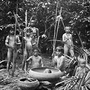 Indians of the Putumayo River with a decapitated head, Amazonia