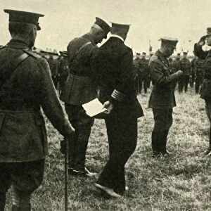 King George V decorates British personnel, Belgium, First World War, 1914-1918, (c1920)