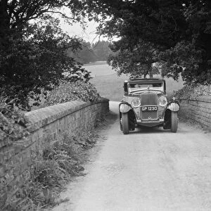 Kitty Brunell road testing a 1931 Delage D8. Artist: Bill Brunell