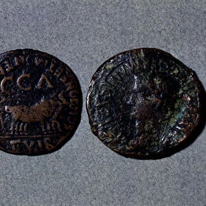 At left a coin with the legend Scipione er Montano II vir CCA, at right the front