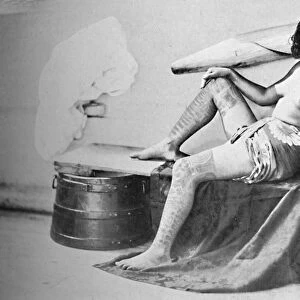 A Marquesa woman with the lower part of the legs fully tattooed, 1902