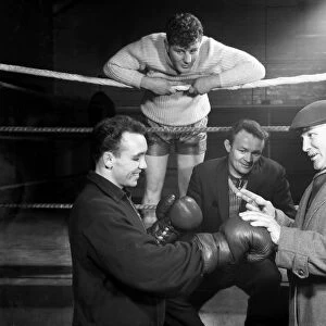 A miner from Sunderland gets some ringside boxing advise, Newcastle, 1964. Artist