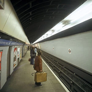 Passengers waiting at Blackhorse tube station on the Victoria Line, London, 1974