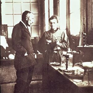 Pierre and Marie Curie in their Laboratory, pub. 1898 (photograph)