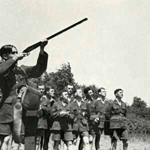 RAF personnel learning to fire guns during the Second World War, 1941. Creator: Charles Brown