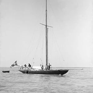 The sailing yacht Rollo at anchor, 1911. Creator: Kirk & Sons of Cowes
