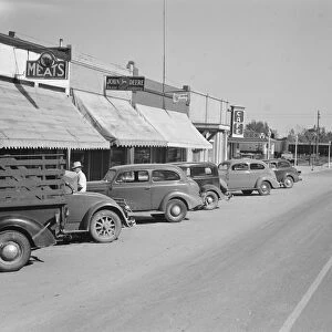 Saturday afternoon, main street of Nyssa, Oregon, 1939. Creator: Dorothea Lange