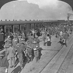Soldiers of the Wiltshire Rifles boarding a train, Cape Town, South Africa, World War I, c1915. Artist: Realistic Travels Publishers