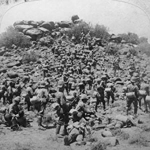 Storming of the Boer kopje by the Suffolks at Colesberg, South Africa, Boer War, 1900. Artist: Underwood & Underwood