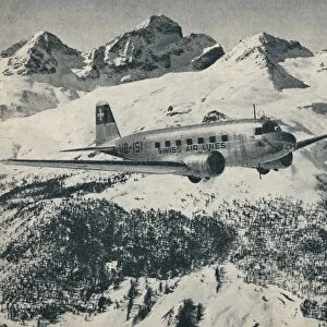 A Swissair plane flying near St Moritz Aerodrome, Switzerland, c1936 (c1937)