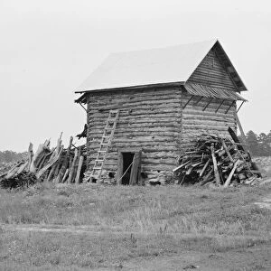 Tobacco barn without front shelter, Person County, North Carolina, 1939. Creator: Dorothea Lange