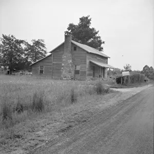 Tobacco sharecroppers house... Whitfield family, near Gordonton, North Carolina, 1939. Creator: Dorothea Lange